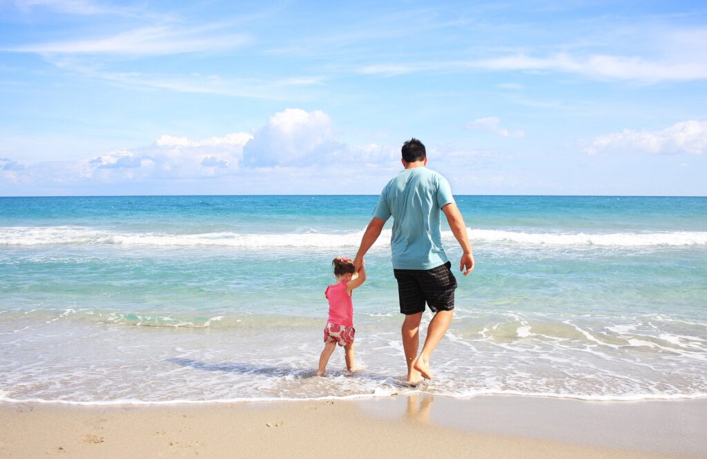 walking across the beach